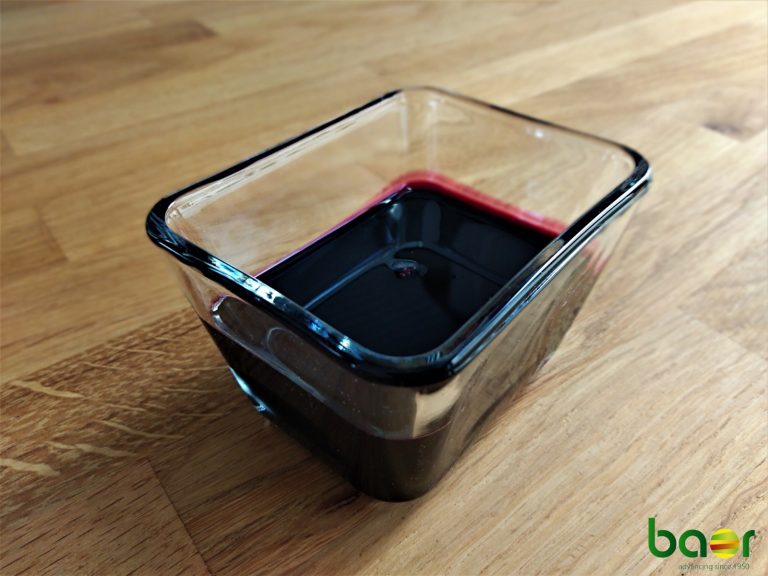 Organic blueberry concentrate 60° Brix in glass container – Baor Products, natural fruit ingredient for food and beverage industry.